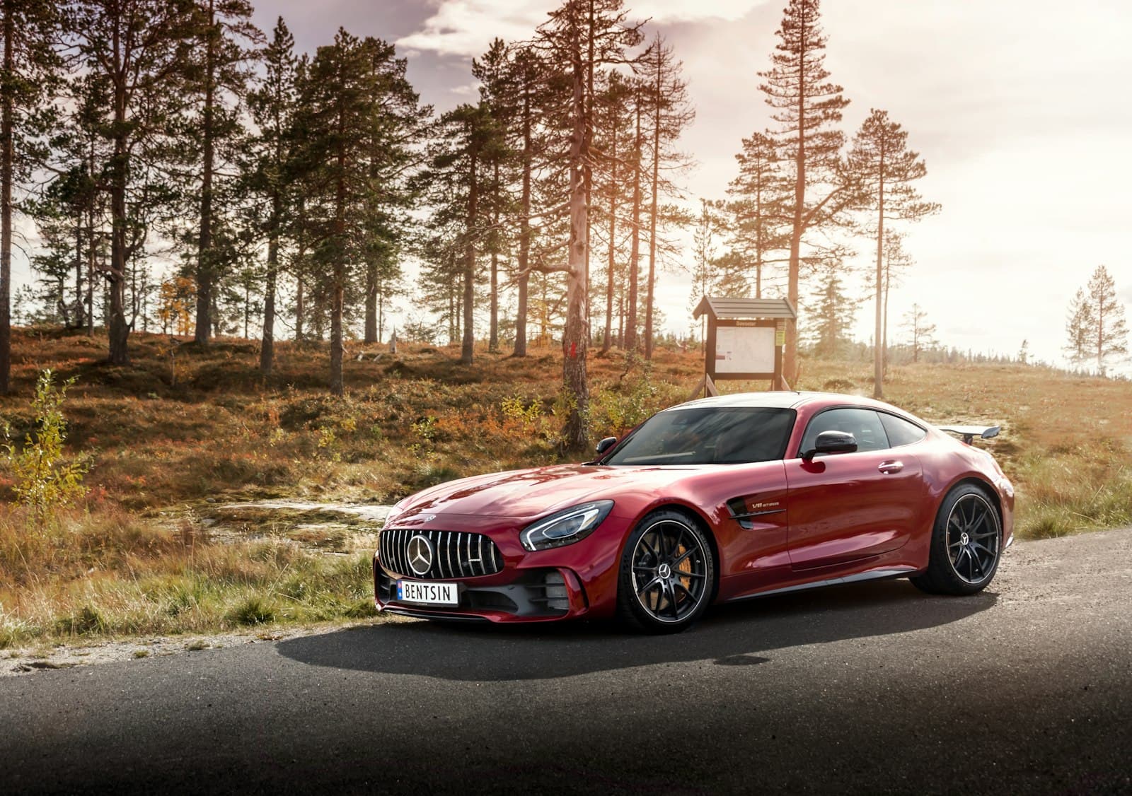 Elegant luxury coupe showcased under dramatic lighting